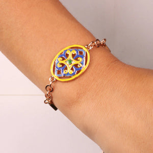 BYSIMON - Bracciale in Metallo cristalli bianchi con dettaglio centrale in maiolica a fiore smaltata blu e giallo