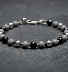 BRACCIALE IMPACT GRIGIO NERO